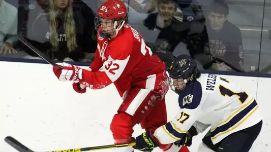 Wilmer Skoog playing hockey at Merimac