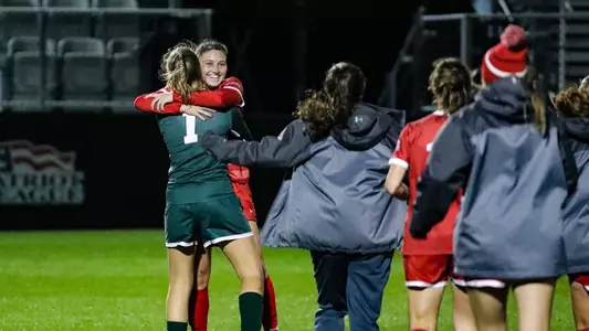 Celia Braun and Elle Conlin embrace after BU beats Army 2-1.
