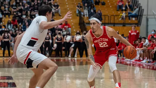 Anthony Morales handles the ball with a Hartford defender in front.
