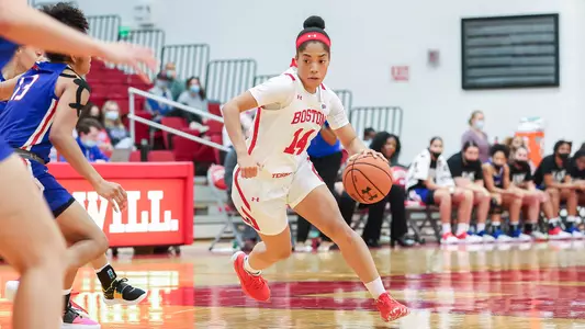 Sydney Johnson works around a defender at the top of the key against UMass Lowell.