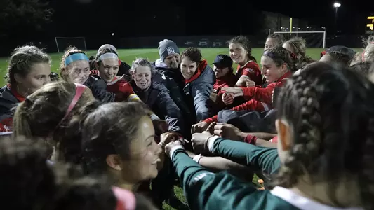 The women's soccer team huddles after its regular season win over Army on Oct. 27.