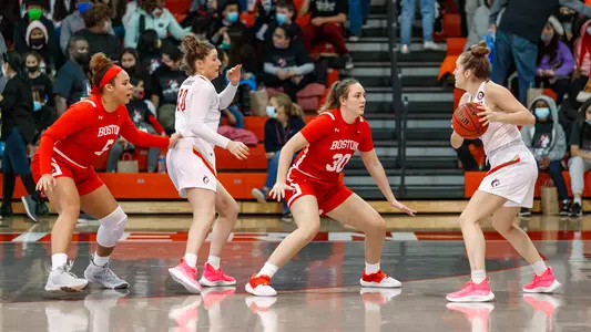 Chiara Tibbitt and Lauren Davenport guard on defense against Northeastern.