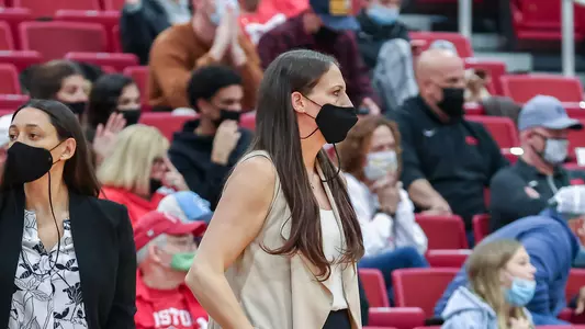 Melissa Graves watches a play from the BU bench at Case Gym.