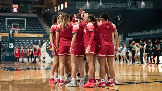The BU women's basketball team huddles before opening tip at Rhode Island.