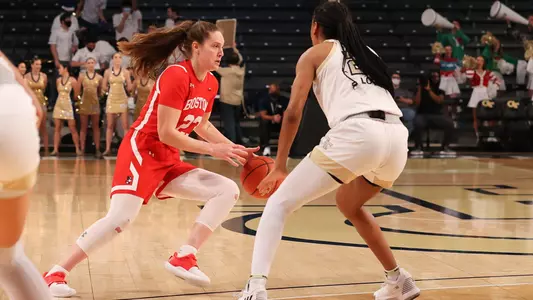 Emily Esposito dribbles near the arc against a Georgia Tech defender.