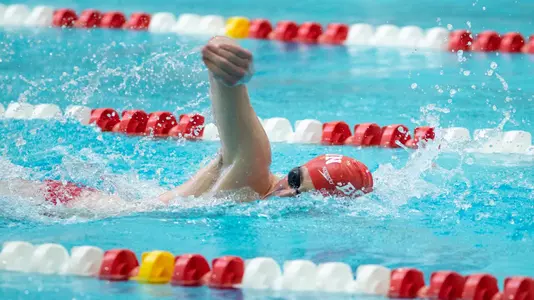 BU men's swimmer taking a stroke