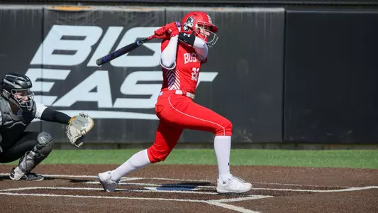 Caitlin Coker hits a pitch batting left handed at the plate.