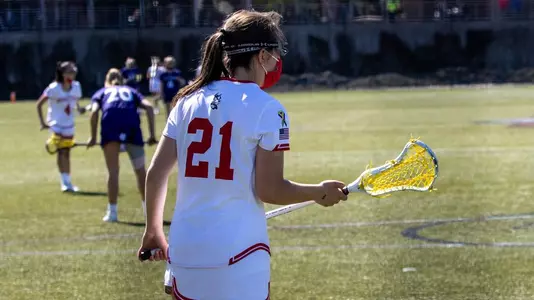 Jennifer Barry standing behind the Holy Cross goal