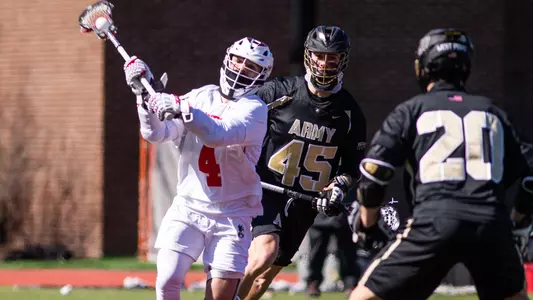 Men's Lacrosse player Anthony Forziati is about to pass the ball