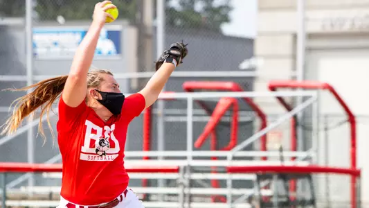 Ali DuBois is in her pitching windup during a practice throw.