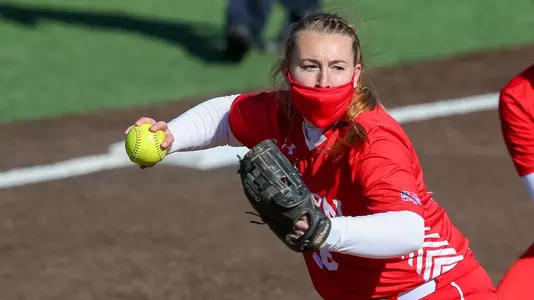Ali DuBois collects a grounder and turns to first to make a throw.