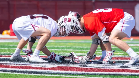 Brian Garrity Taking a Faceoff at Colgate