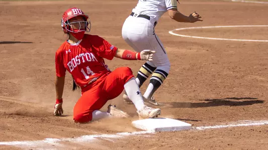 Jen Horita slides into third base to beat a throw.