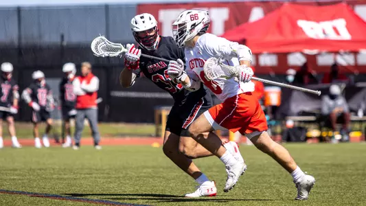 James Corcoran runs past a Utah defender