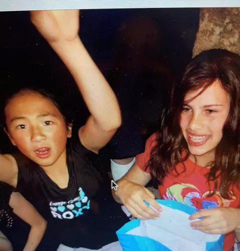 Marina Sylvestri and Jen Horita as children