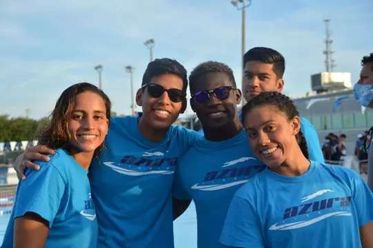 Julimar Avila with Azua Aquatics teammates