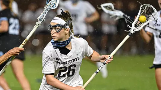 Maria Auth playing lacrosse