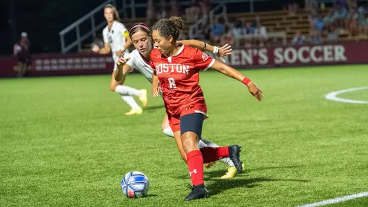 Marli Rajacich dribbling off a BC defender