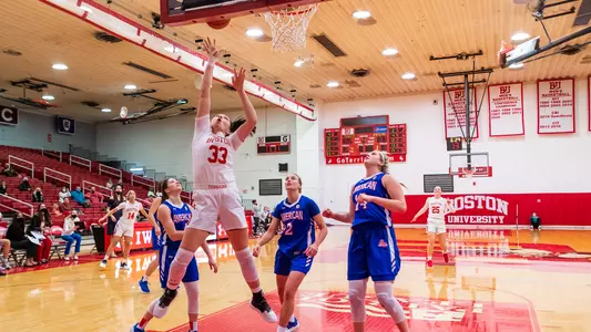 Maren Durant goes for a layup against three American defenders.