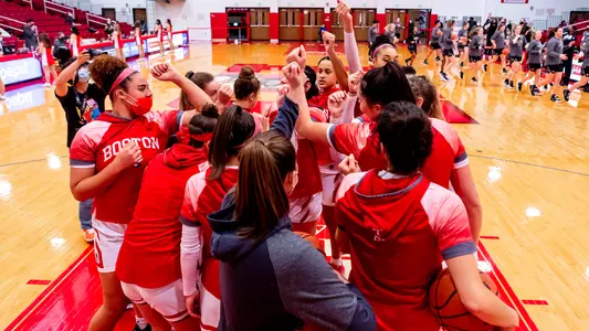 The women's basketball team huddles before introductions against Army.