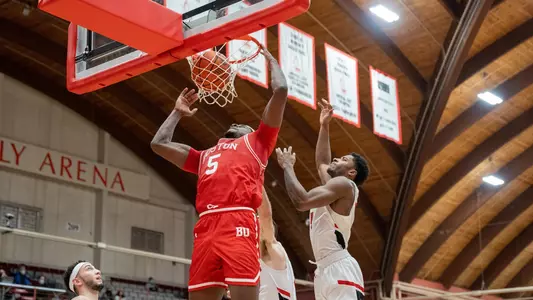 Walter Whyte finishes off a slam dunk at Hartford.