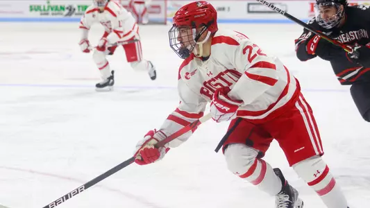 Brian Carrabes skating with the puck