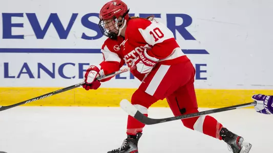 Jesse DeVito shooting a puck