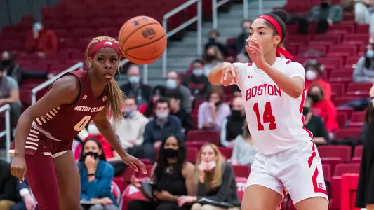 Sydney Johnson passes the ball in front of a Boston College defender.