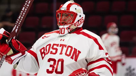 Patrick Schena on the ice in his goalie gear during warmups