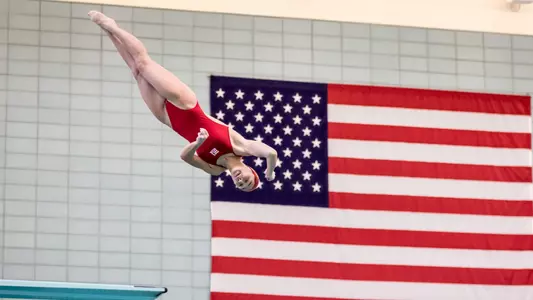 Sumi Cameron goes through a dive off the board at Boston University