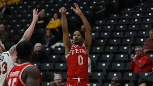 Ethan Brittain-Watts attempts a 3-point shot in the corner