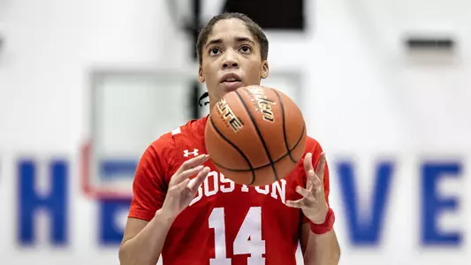 Photo of women's basketball senior Sydney Johnson preparing to shoot a free throw at UMass Lowell.