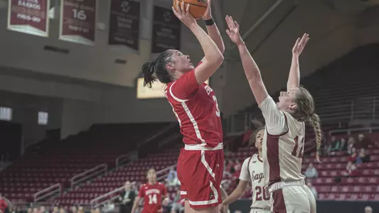 Photo of women's basketball senior Maren Durant going for a layup at Boston College.