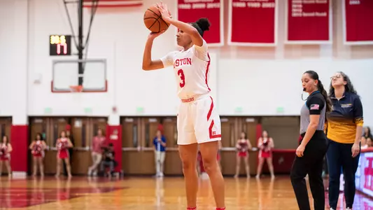 Photo of women's basketball senior Kelsi Mingo shooting a three-pointer.