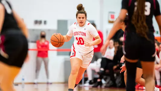 Alex Giannaros surveys the court while dribbling the ball against Lafayette.
