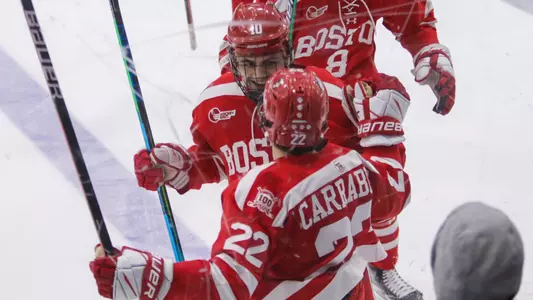 Nick Zabaneh and Brian Carrabes celebrate a goal at Providence