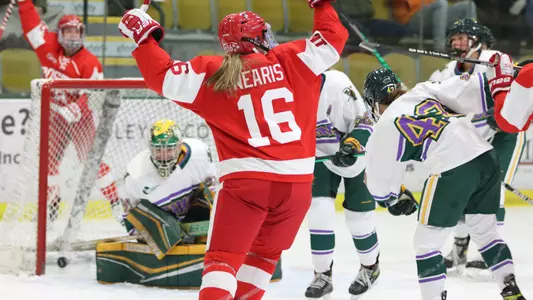 Julia Nearis celebrates a goal in the Terriers' 4-3 win over Vermont on Feb. 11, 2022