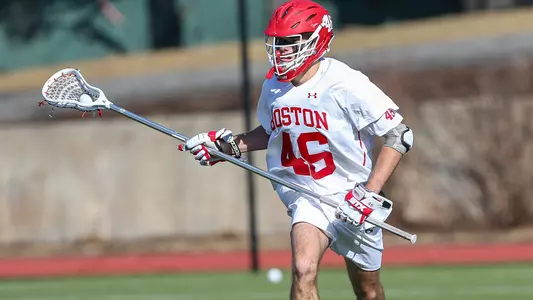 Dane DeGoler playing lacrosse