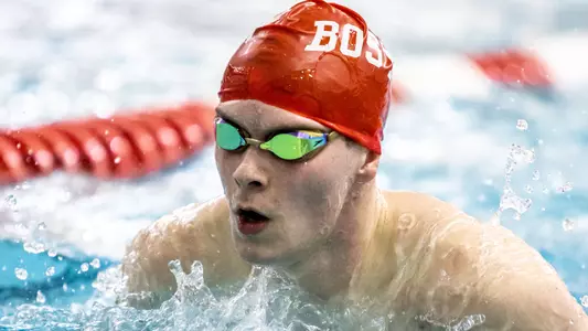 A Terrier swimmer competes at the Boston Winter Open