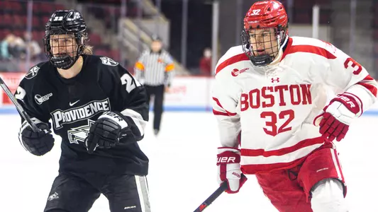 Wilmer Skoog skating next to a Providence player
