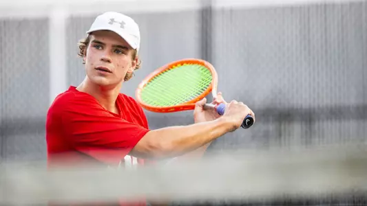 Gabe Brown gets ready for a volley at the net