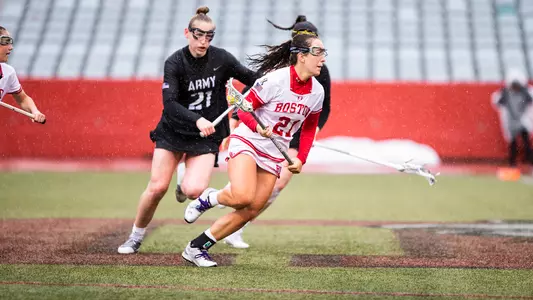 Jennifer Barry races up the field after controlling a draw against Army.