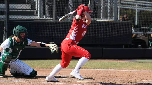 Lauren Keleher follows through on a hit toward the outfield against Charlotte.