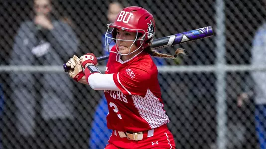 Emily Gant follows through on a swing batting left handed against UMass Lowell.