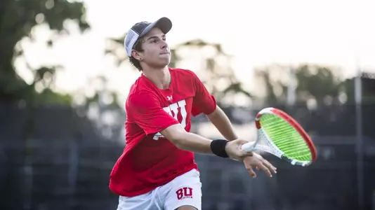 Adrian Pawlowski goes for a volley near the net
