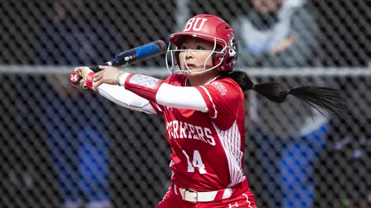 Jen Horita swings through on a pitch batting left handed.