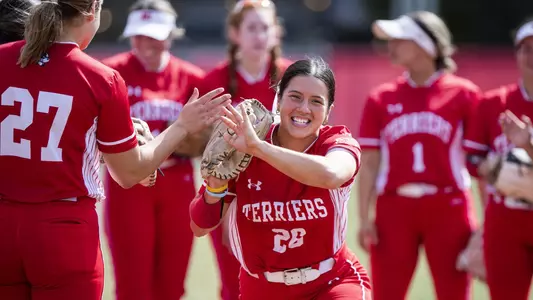 Lauren Keleher high-fives a teammate as her name is announced during starting lineups.
