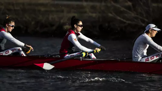 BU women's lightweight rowing boat goes down the Charles River