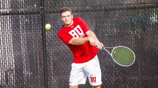 Ben Letzer is halfway on double backhand swing