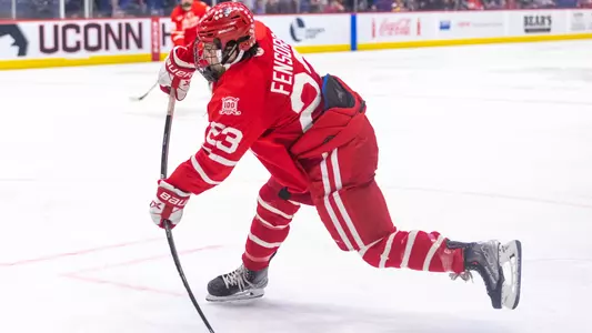 Domenick Fensore shooting the puck